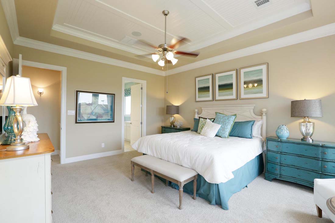 Walk-in closet off bedroom in Chesmar model home