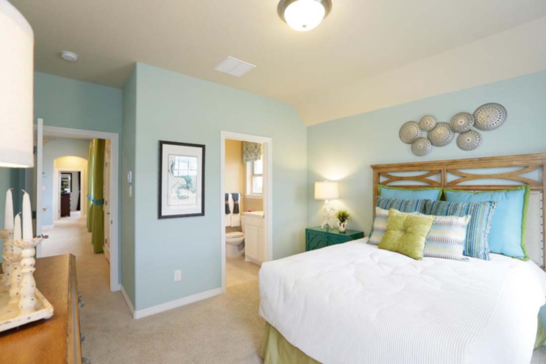 Bedroom with ensuite in Chesmar model home